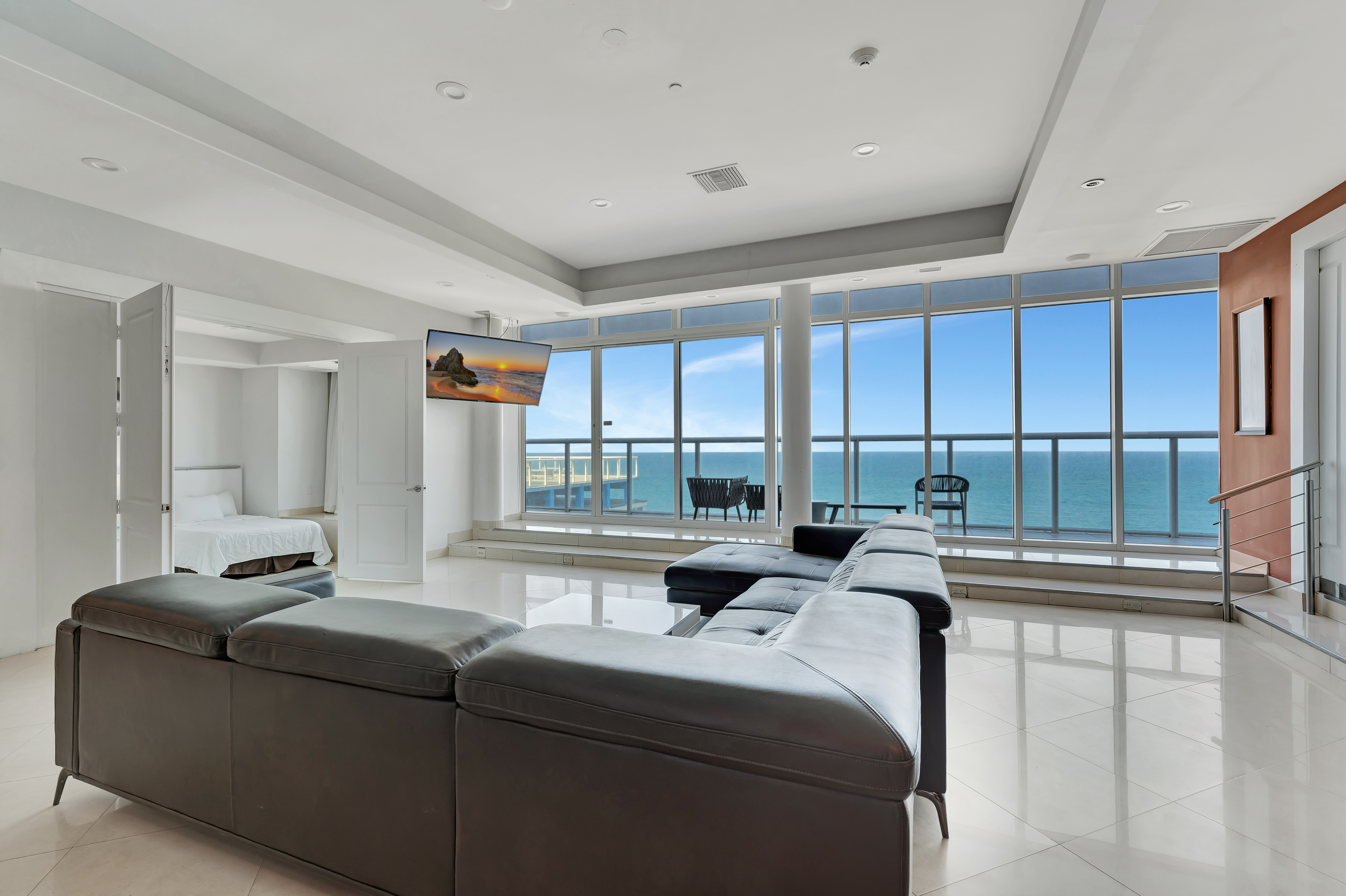 Main Living Room in Ocean Manor Penthouse 1002 with Oceanfront Balcony and Bedroom Access