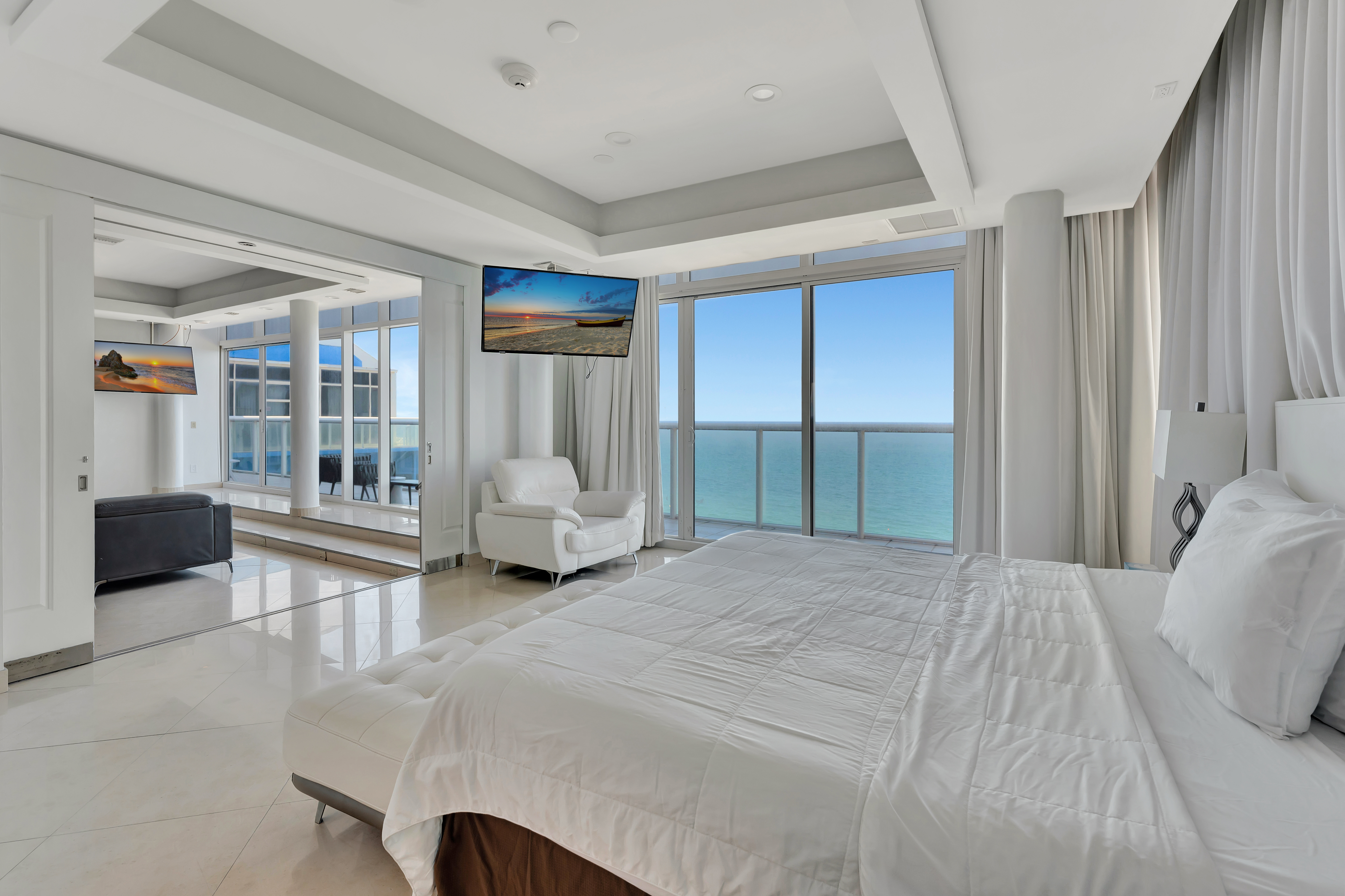 Oceanfront Master Bedroom in Ocean Manor Penthouse 1002 with Balcony and Lounge Access