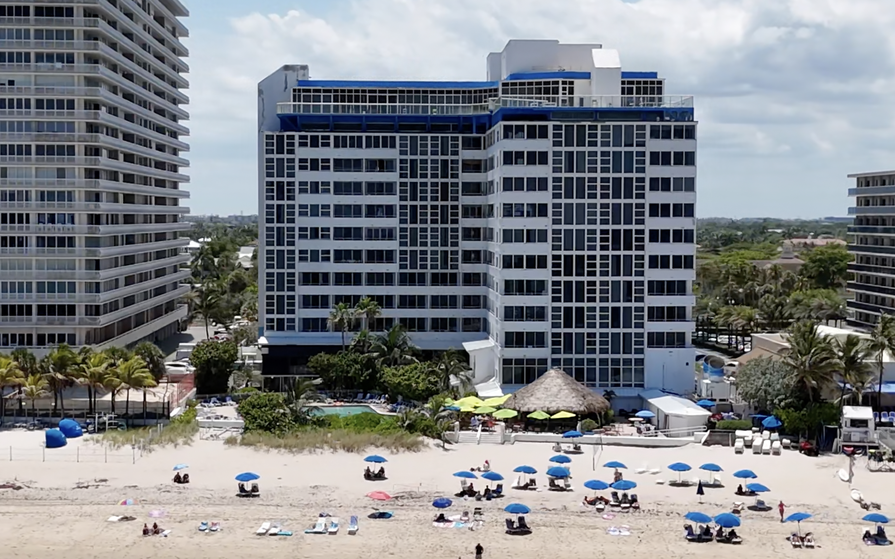 4K aerial beachfront view of Ocean Manor Beach Resort on Fort Lauderdale's Galt Ocean Mile