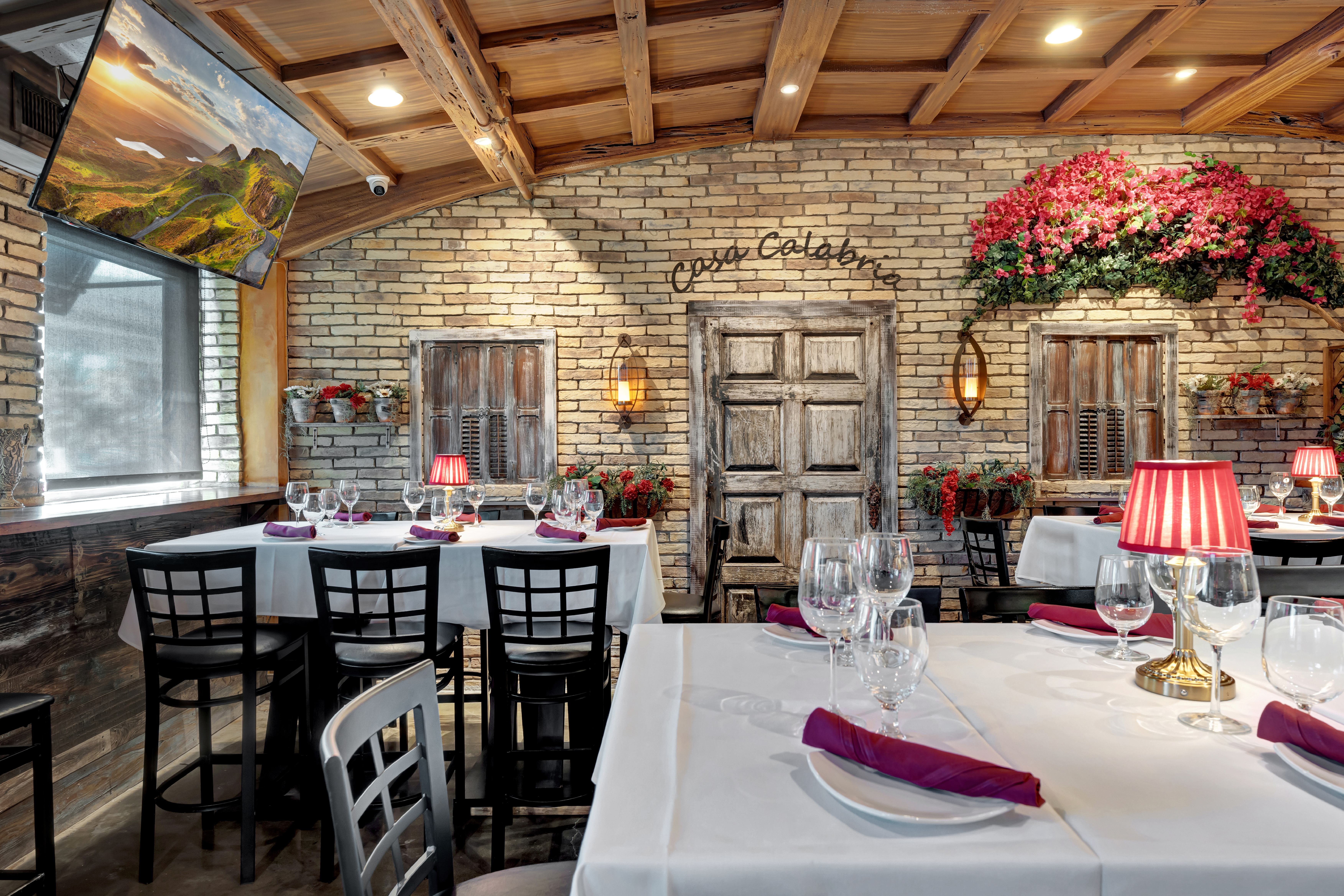 Casa Calabria interior with Italian wall art and warm lighting
